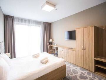Фото номера Двухместный номер Делюкс с 1 кроватью и балконом Отель Hotel Rondo г. Wąbrzeźno 3